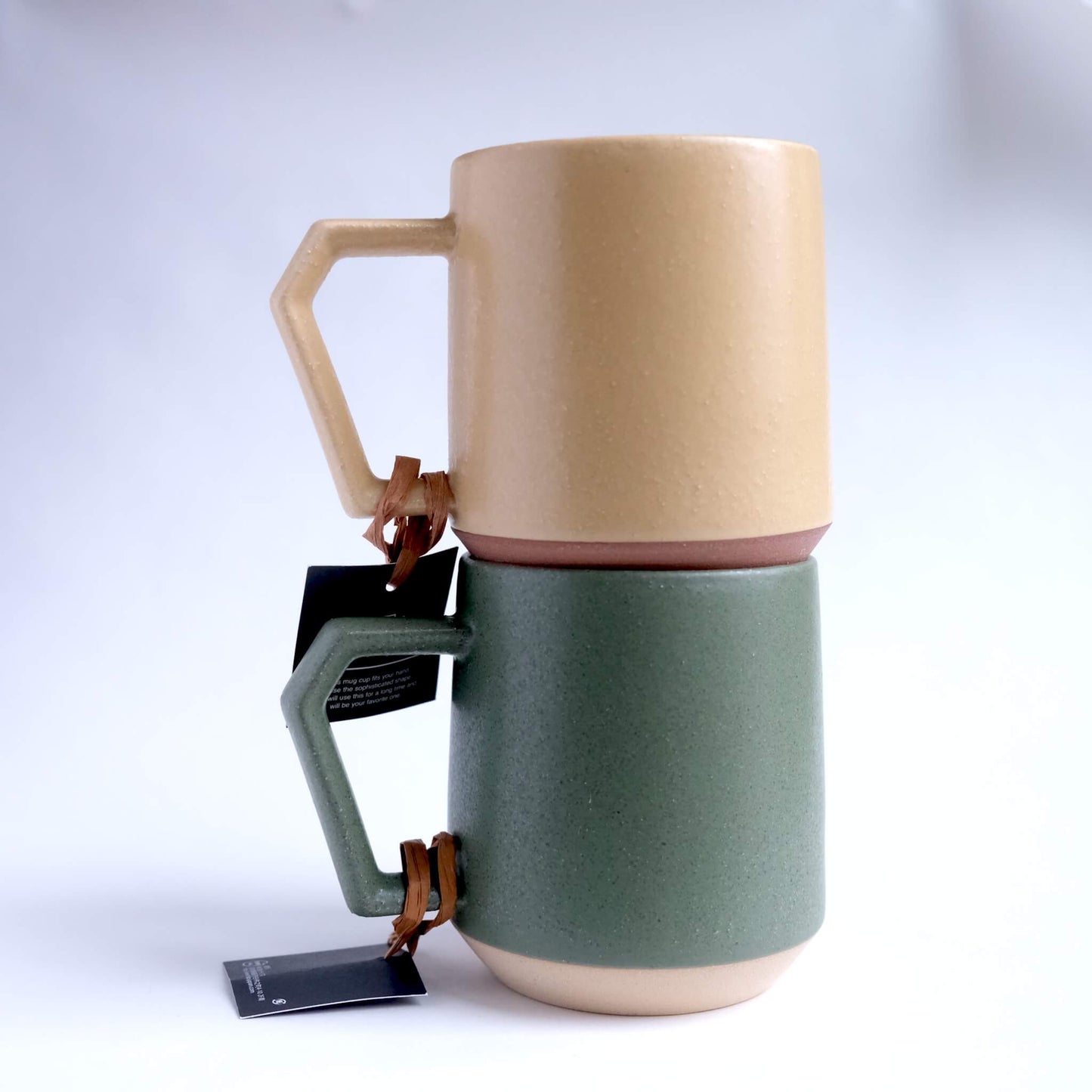Chips mugs outdoor editions, color tan and Khaki, stacked together.