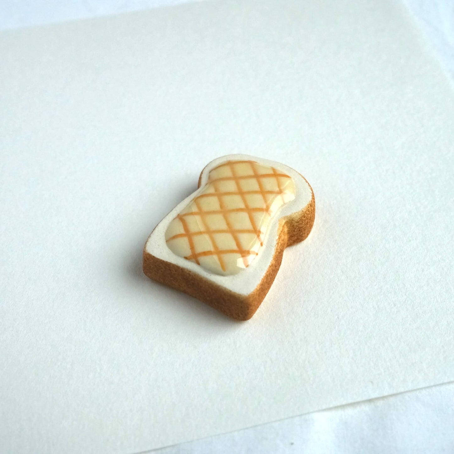 Top view of ceramic melon toast chopstick rest, adding a touch of Japanese Kawaii charm to your table.