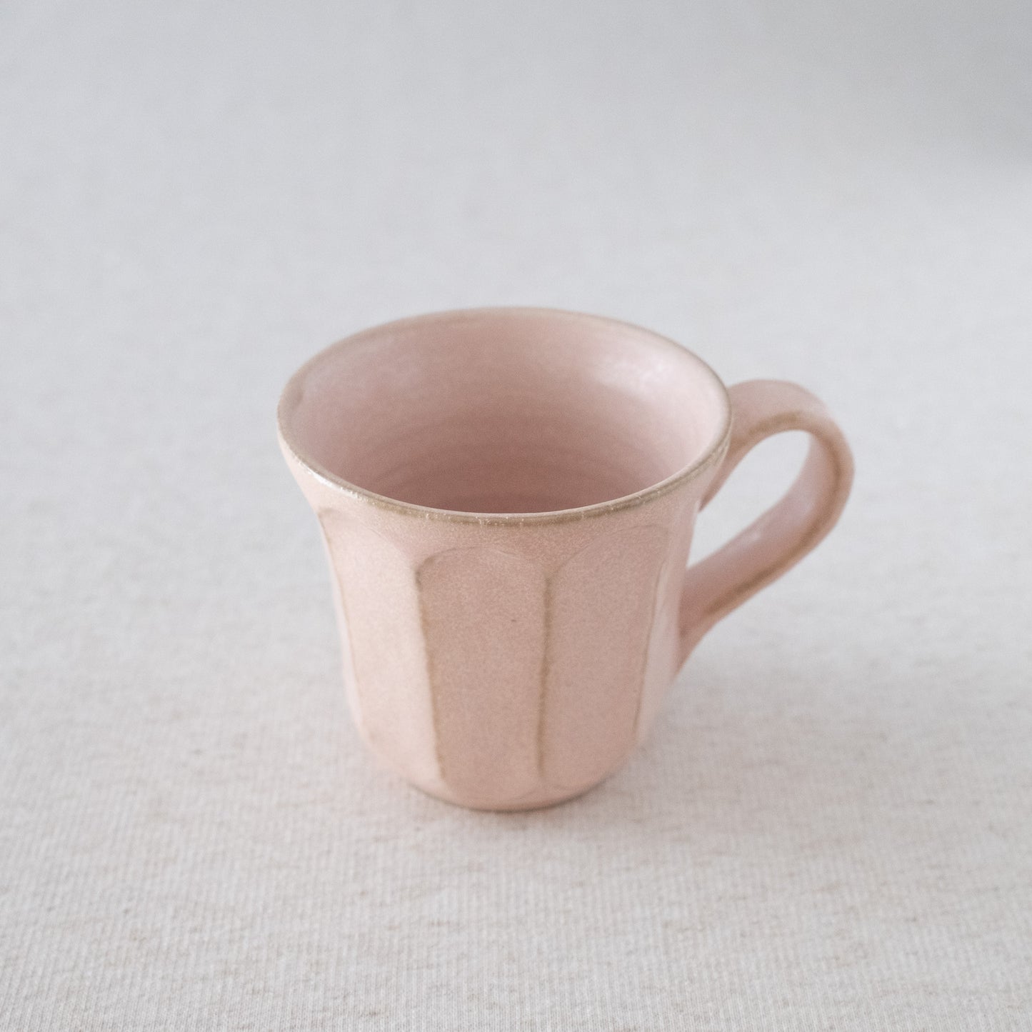 Elegant handcrafted pink coffee mug made in Japan - Side view