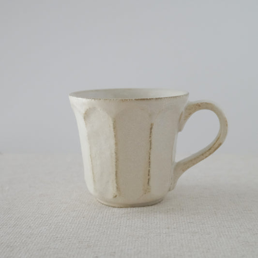 Elegant handcrafted white coffee mug made in Japan - Side view