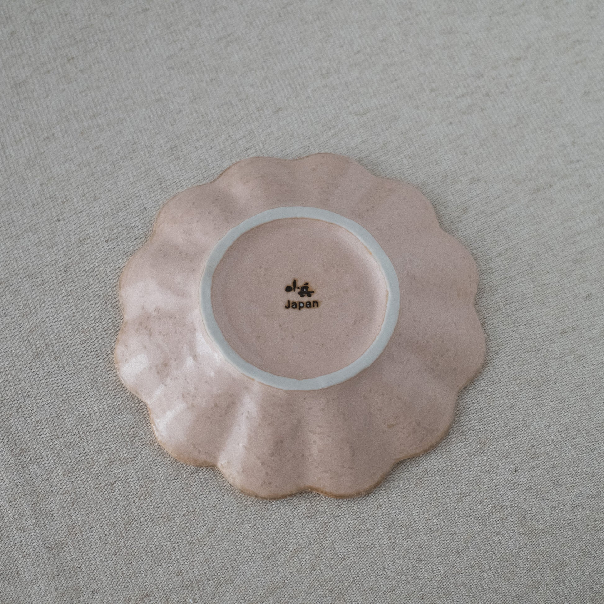 Elegant handcrafted pink dessert plate made in Japan - Bottom view